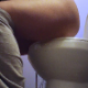 A girl sits down on a toilet to take a shit. Subtle plops and pissing can be heard shortly thereafter. Audio is not loud. Presented in 720P HD. About 2.5 minutes.